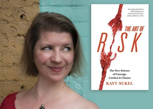Author Kayt Sukel poses next to her book "The Art of Risk"